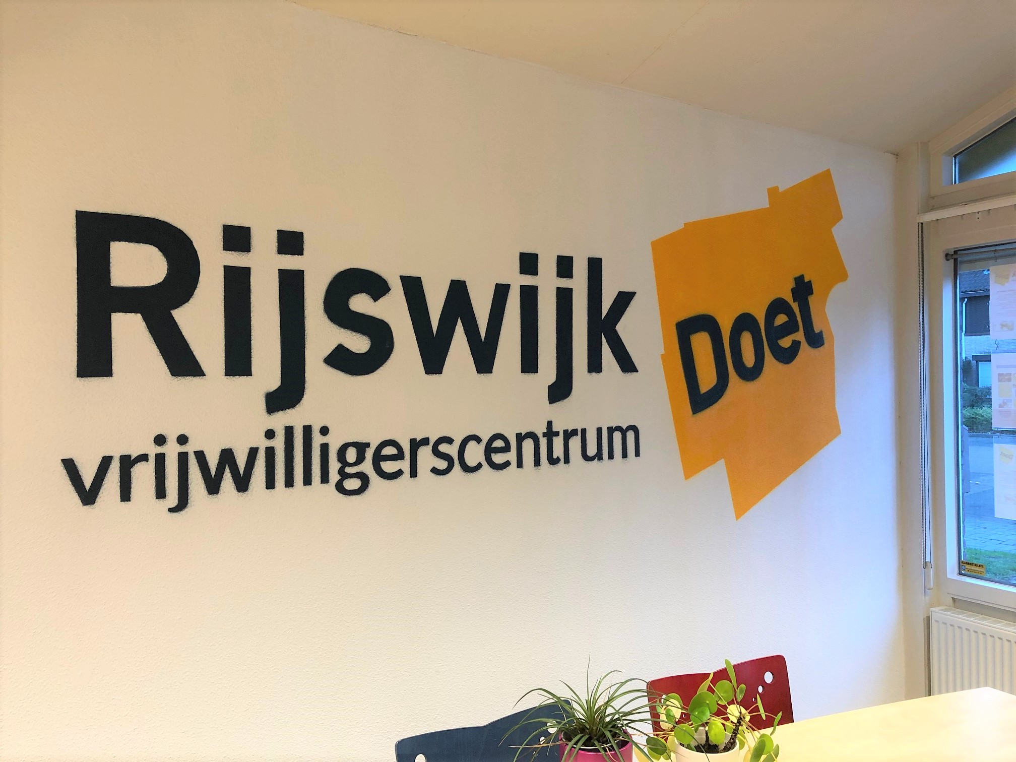 Muurschildering in kantoor van Rijswijk Doet